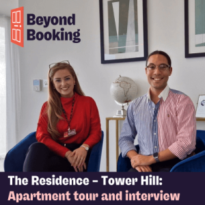 Jessica from Situ and Solomon from The Residence smiling beneath the Beyond Booking logo